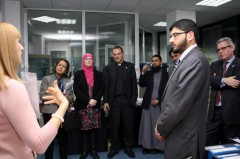 Delegation receives a briefing on ICMP's identification efforts in the DNA laboratory.